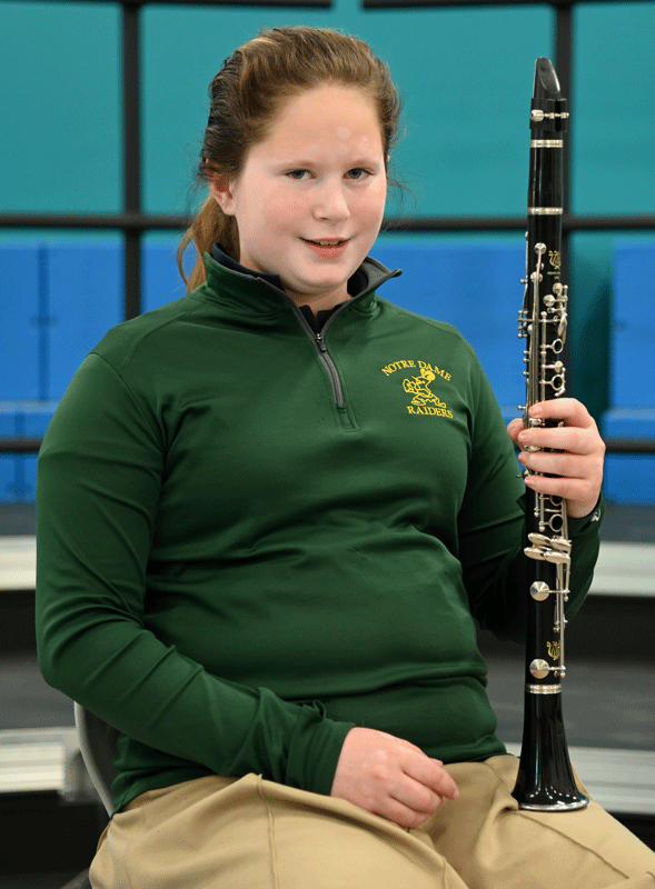 student with clarinet