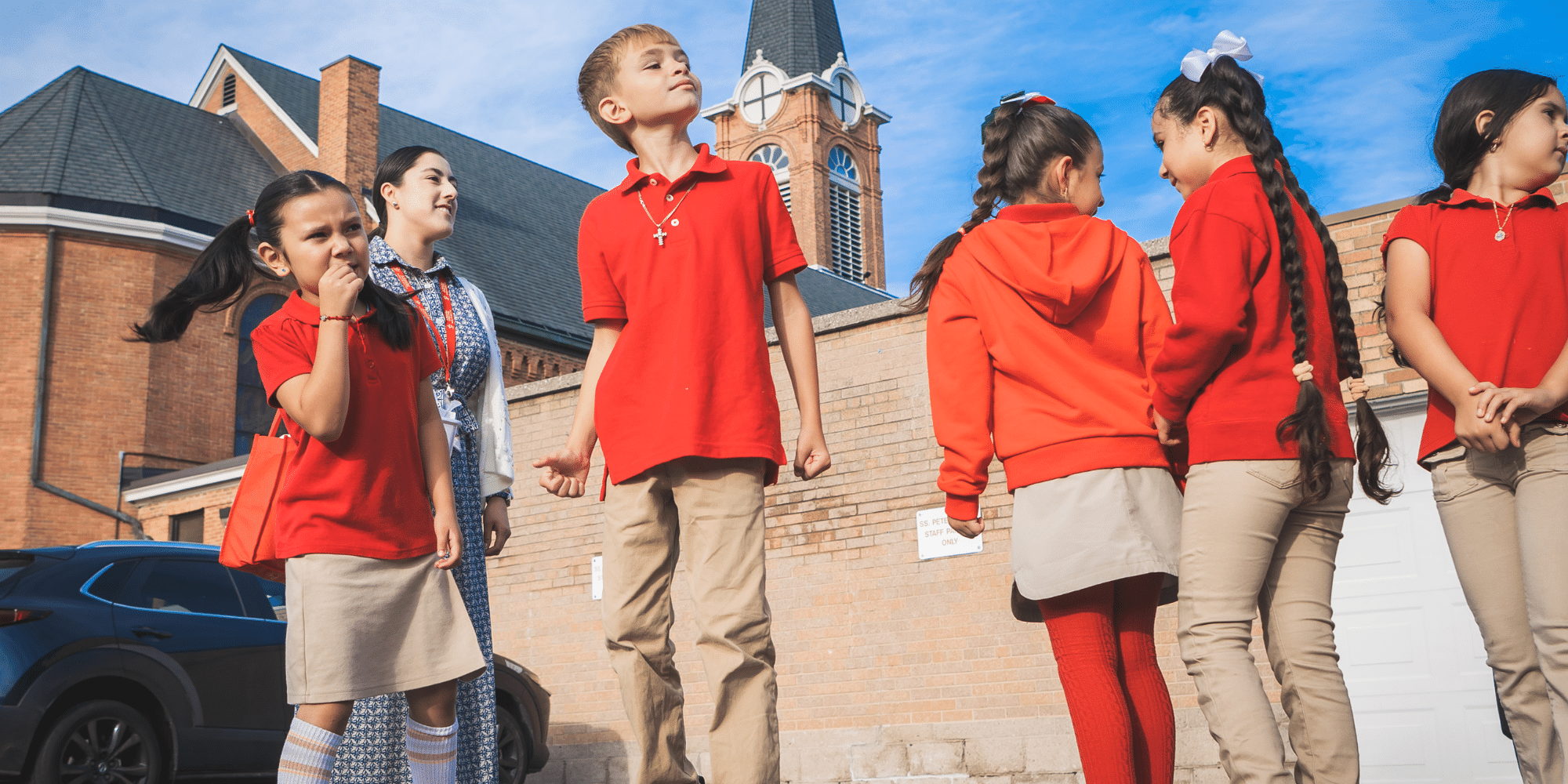 St. Thomas More Students lined up in front of school